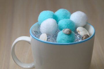 Mug with Blue and White Pom Poms and Shells