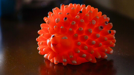 Abstract red spiky organic shape, Red biomorphic abstract object, Surreal red textured sphere, Futuristic organic abstract form, Creative red spiked macro object.