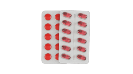 Red Pills and Capsules in Blister Packs on White Background