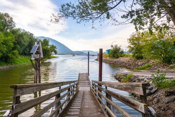 Wooden pier extending into shuswap lake in salmon arm, british columbia