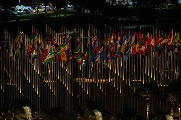 Doha, Qatar - October 9, 2025: The Flag Plaza, displays 119 flags from countries with authorized diplomatic missions, including flags of the European Union, the United Nation and the GCC.