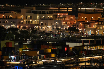 Doha, Qatar - December 10, 2025: Night view of Old Doha port redevelopment into Mina district Box Park Qatar