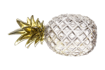Glass pineapple with detailed faceted body and luminous golden crown