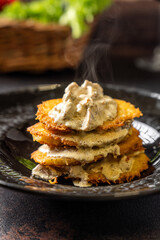 Crispy Potato Fritters With Creamy Sauce Stack