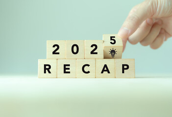 2025 Recap economy, business, financial concept. Business planning in 2026. RECAP text on wooden...