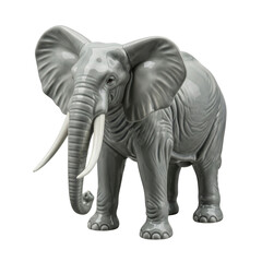 Fototapeta premium Grey porcelain elephant figurine with big tusks standing representing wild safari animal