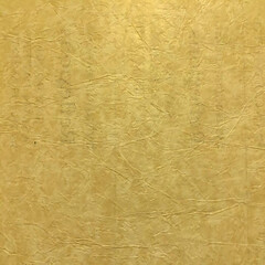 Golden textured background with crumpled paper effect