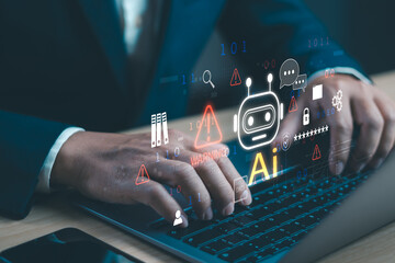 concept of AI cyber security or technology scam alert , Businessman showing data protection or warning about using AI technology to access malicious software or online threat on computer