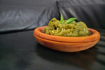 guacamole and chips Sambal hijau,Sambal Ijo,Sambal lado mudo,Green chili sambal,Green chili paste,Green chili sauce.Traditional Indonesian sambal from West Sumatra