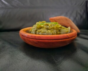 guacamole and chips,Sambal hijau,Sambal Ijo,Sambal lado mudo,Green chili sambal,Green chili paste,Green chili sauce.Traditional Indonesian sambal from West Sumatra