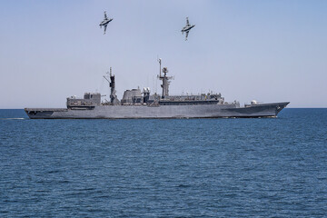 Military warship and aircrafts in the Black Sea during a peacekeeping operation.