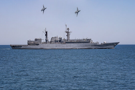 Military warship and aircrafts in the Black Sea during a peacekeeping operation.
