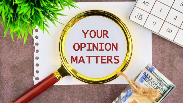 The conceptual phrase YOUR OPINION MATTERS appears on paper through a magnifying glass, Your feedback is important concept.