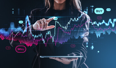 Businesswoman analyzing forex and crypto chart data on futuristi