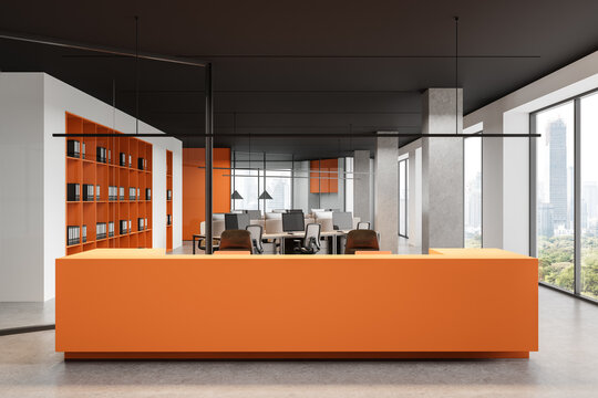 Modern open space office interior with orange reception desk, bookshelf, and workstations in high-rise building with panoramic windows concept. 3D Rendering - Powered by Adobe