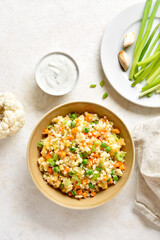 Cauliflower fried rice with carrot, green pea, corn, scrambled eggs