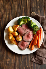 Traditional Sunday roast beef with vegetables