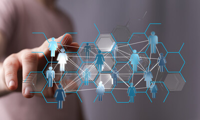 Hand reaching out to interact with a network of connections symbolizing communication, teamwork, and global relationships in a modern tech envir