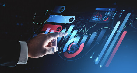 Businessman analyzing futuristic stock market chart with financial data and bar graphs on digital interface background conceptually illustrating investment growth.