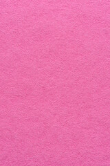 Pink paper background or backdrop with fine details and smooth texture with copy space for text design element