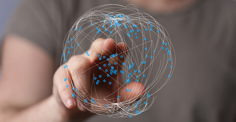 Close-up of a hand touching a 3D rendered sphere. Illustrative concept of global connections, the digital world and networking. Techn
