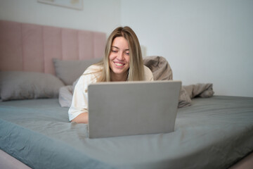 Playful Morning Browsing While Resting in Bed