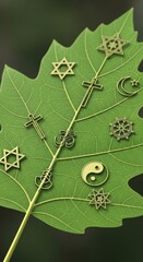 Religious symbols of the world on a green leaf, representing unity and diversity.