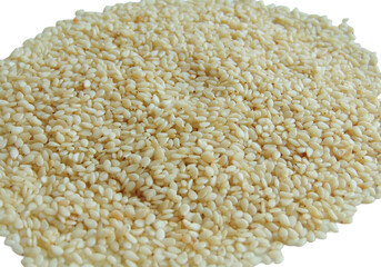 Background with sesame seeds. Pile of sesame seeds