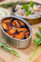 Canister of canned mussels