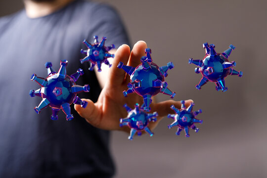 Abstract conceptual image featuring a hand reaching towards virus-like structure, symbolizing protection and d