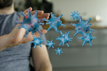 Artistic depiction of virus particles interacting with a hand, symbolizing pandemic awareness and health crisi