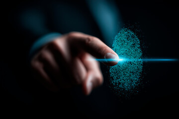 Person using fingerprint scanner technology on dark background with hand gesture highlighting security and authentication concept in digital world