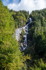 The beautiful Branzi waterfall, Lombardy, Italy.