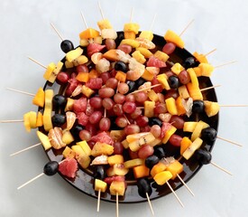 composition of cut various fruits close up dish