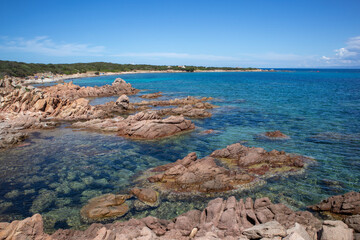 Rocks and water on the beach of San Silverio, Sardinia, Italy.