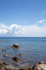 Rocks and water on the beach of San Silverio, Sardinia, Italy.