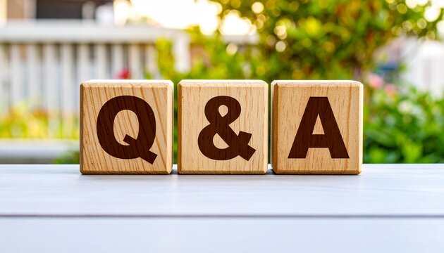 Q&Aと書かれた木のブロック 16:9サイズ