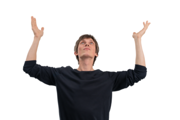 Young man raising both hands and looking upward with confident expression, isolated on white background, closeup concept for success or hope