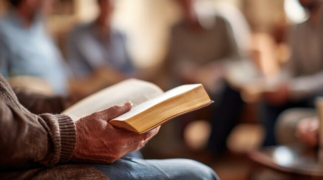 Closeup of a missionary holding a small group Bible study session, fostering deeper connections and discussions about faith and the message of Christ.