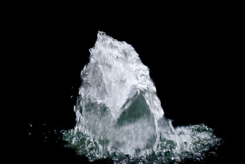 splash of water on black background, close-up