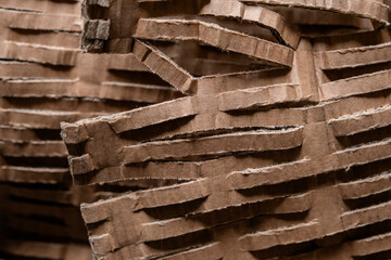 Detail of void fill recycled corrugated cardboard netting mat