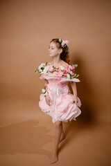 photo session of a girl in a bouquet of fresh flowers