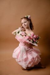 photo session of a girl in a bouquet of fresh flowers