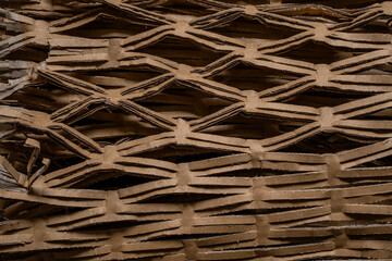 Void fill packaging recycled corrugated cardboard netting mat, close up