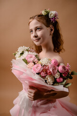 photo session of a girl in a bouquet of fresh flowers