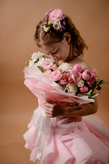 photo session of a girl in a bouquet of fresh flowers