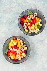 seafood salad and exotic fruits.