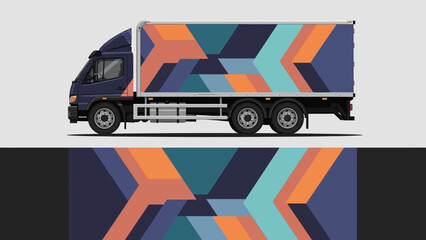 Colorful geometric patterned cargo truck with abstract shapes and bold angular design.
