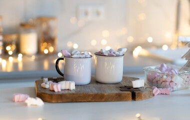 Hot Cocoa Drink Steaming Standing In Kitchen With Christmas Lights