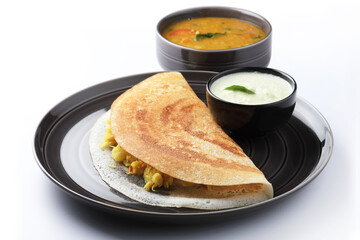 Hot South Indian Masala Dosa served with sambhar and  chutneys 